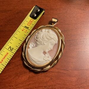 Elegant Gold and White Cameo Pendant